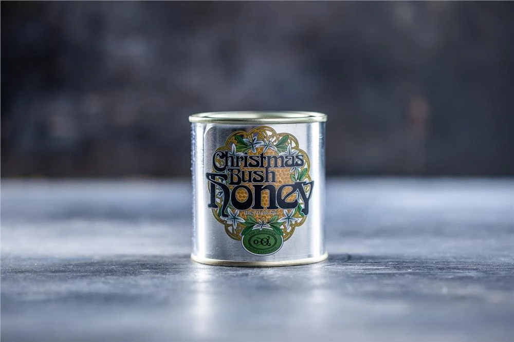 Honung Christmas Bush 350 g 296401 by Tasmania color Svart